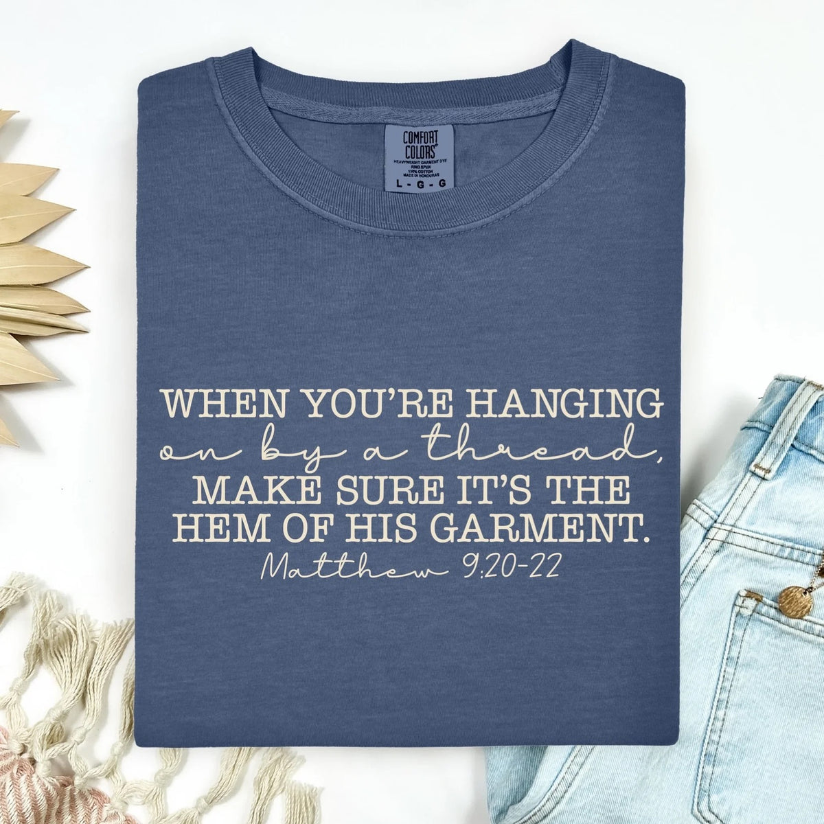 By the Hem of his garment tee